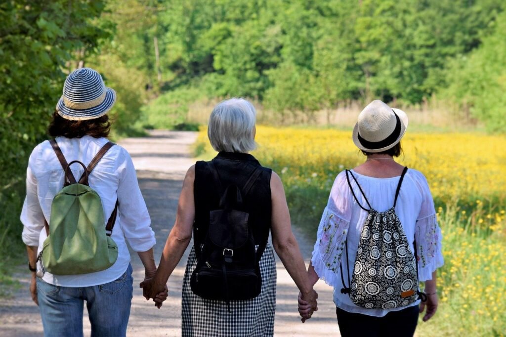 Group of women holding hands walking together